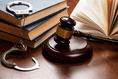Criminal Defense attorney - gavel and handcuffs